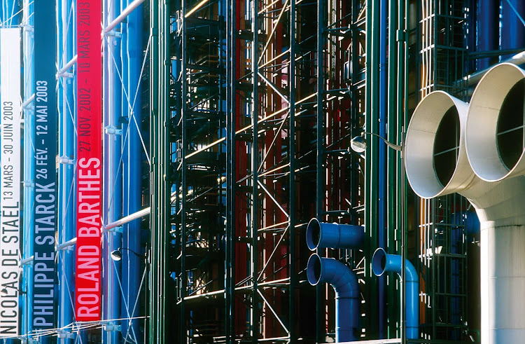 The Pompidou Center in Paris showcases modern art. The plaza  out in front is a great place for people watching with jugglers, dancers and musicians performing. 