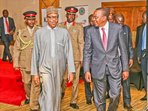 WEST MEETS EAST: President Muhammadu Buhari and President Uhuru Kenyatta after the Kenya-Nigeria Business Forum at a Nairobi hotel yesterday