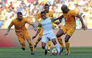 Sphelele Mkhulise of  Sundowns is challenged by Chiefs' Daniel Cardoso, Hendrick Ekstein and Willard Katsande. 