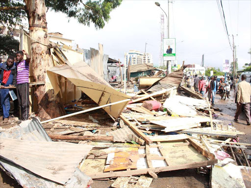 Shops and a garage that were demolished on a land next to Woodley estate yesterday /EZEKIEL AMING’A