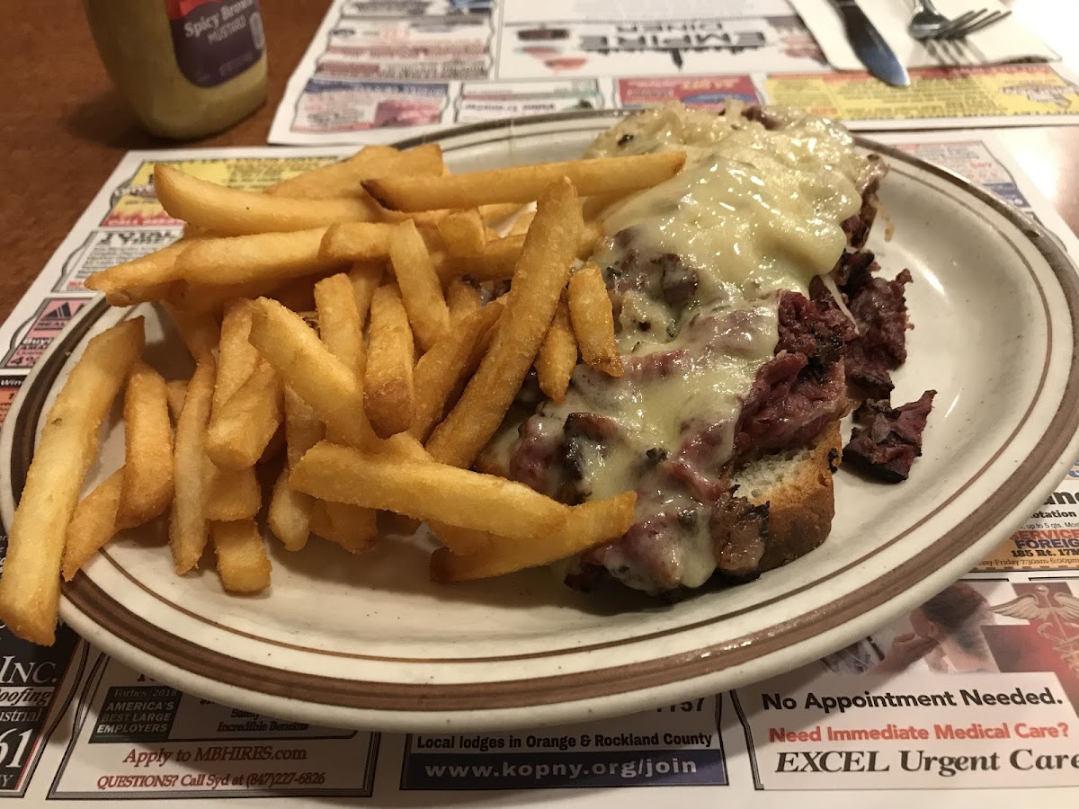 Open face Pastrami sandwich with French fries