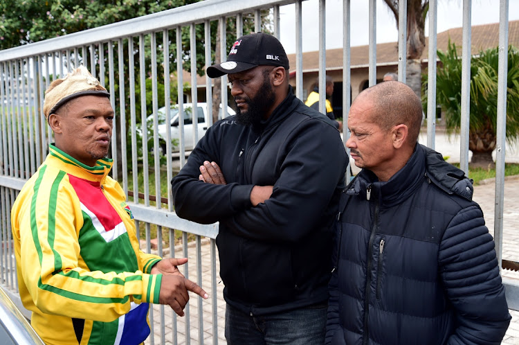 ANC MPL Christian Martin, left, speaks to Eastern Province Rugby Union general manager Thando Manana, centre, and Cameron Geduld, after the #SpringboksTour parade at the weekend was cancelled.