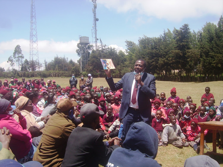 Lari MP Jonah Mburu during a parents meeting at Kibagare primary school on Tuesday.