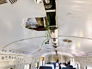 Stolen light fittings leave live wires hanging loose and passengers in the dark.