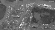 A black and white satellite image shows destroyed and damaged port facilities following Hurricane Ida, in Port Fourchon, Louisiana, US, September 2, 2021. 