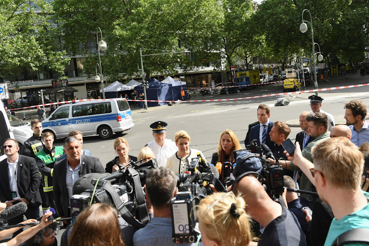 Berlin's Mayor Franziska Giffey speaks with members of the media, while visiting the crime scene where a car crashed into a group of people, near Breitscheidplatz in Berlin, Germany, June 8, 2022.