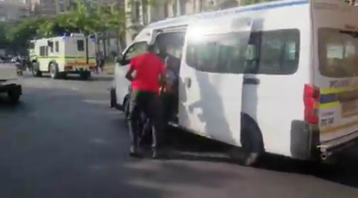 Police arrest supporters of eThekwini mayor Zandile Gumede outside the Durban city hall on July 11 2019.