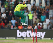 Andile Phehlukwayo of South Africa celebrates the wicket of Hasan Ali of Pakistan.