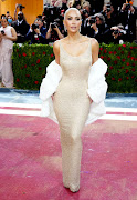 Kim Kardashian in the iconic Marilyn Monroe dress she is accused of damaging. File image.