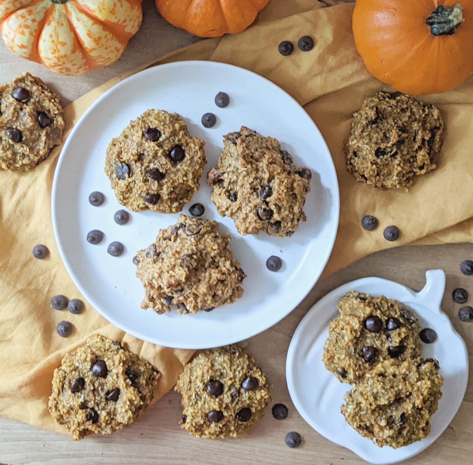 top down view of pumpkin spice cookies surrounded by pumpkins