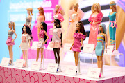 The new and old versions of the classic Barbie dolls are on display at Mattel Design Center in El Segundo, California, US, February 22, 2024. 