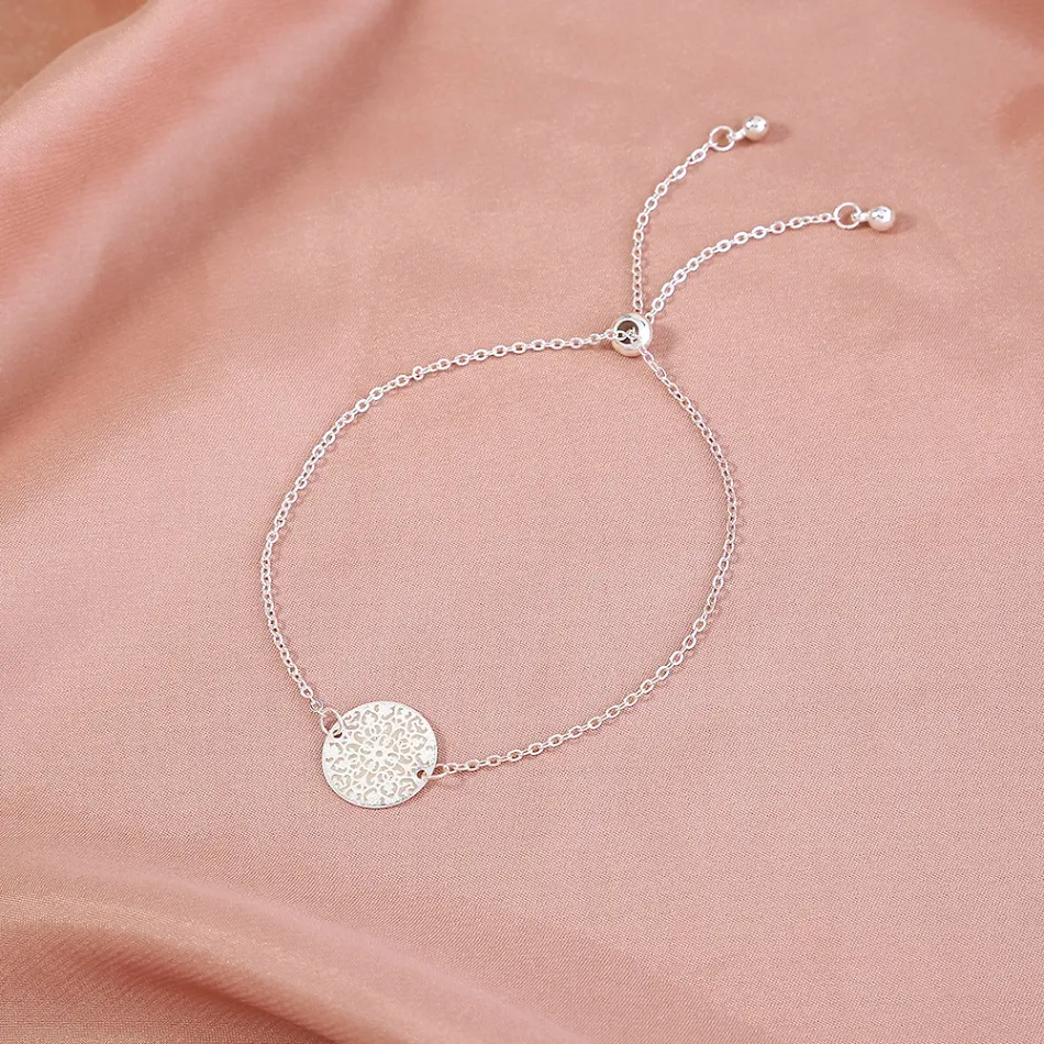 Bracelet Pendentif Rond en Cuivre avec Slice Drop, Huile Lumineuse et Éclat, pour un style élégant et une touche de lumière.