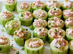 Cucumber Cups Stuffed with Spicy Crab was pinched from <a href="http://domesticfits.com/2011/07/07/cucumber-cups-stuffed-with-spicy-crab/" target="_blank">domesticfits.com.</a>