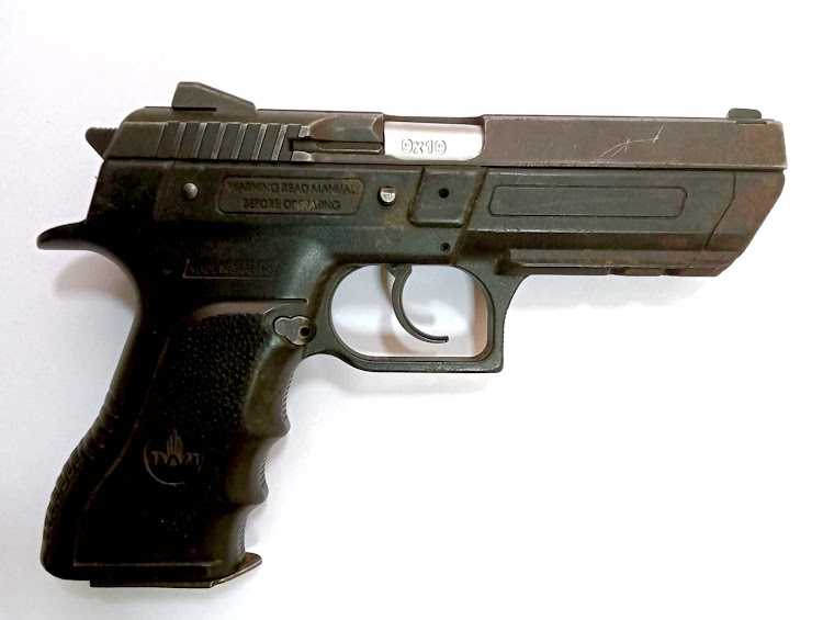 The recovered stolen Jericho Pistol Serial Number KE KP44330654 belonging to a police officer.