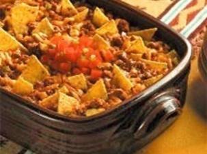 Not my photo, but tortilla chips are on top of casserole.