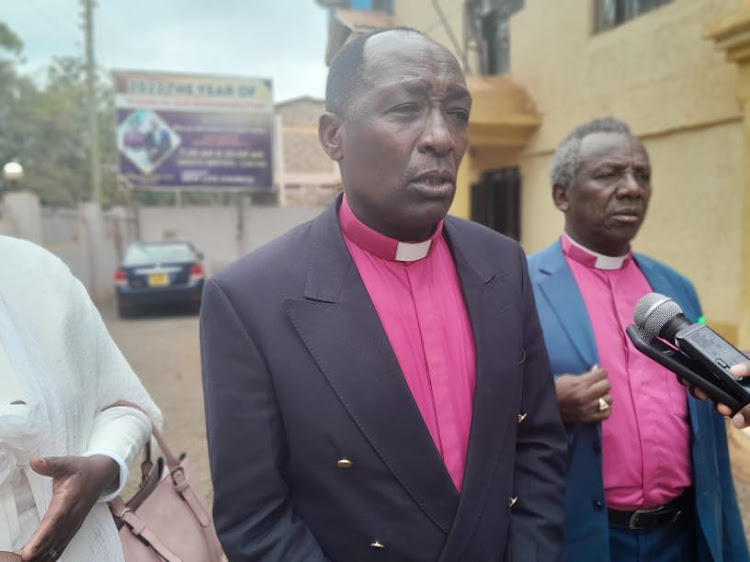 Bishops Paul Wanjohi of New Life church and Erastus Njoroge of Four Square church speak to the media outside New Life church in Nyeri town Wednesday, August 17.