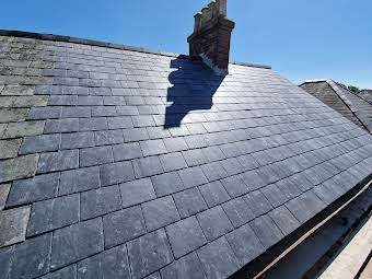 Natural Spanish Slate re-roof  album cover