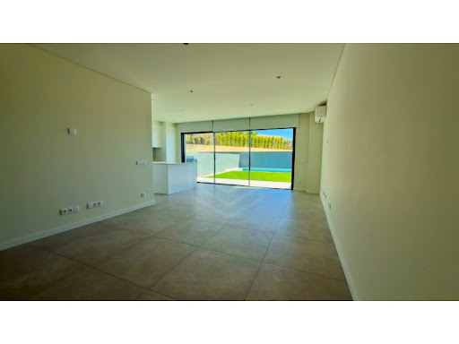 Modern living room with outdoor pool in this luxury property for sale in Montenegro ($1,217,787 - 227 m²)