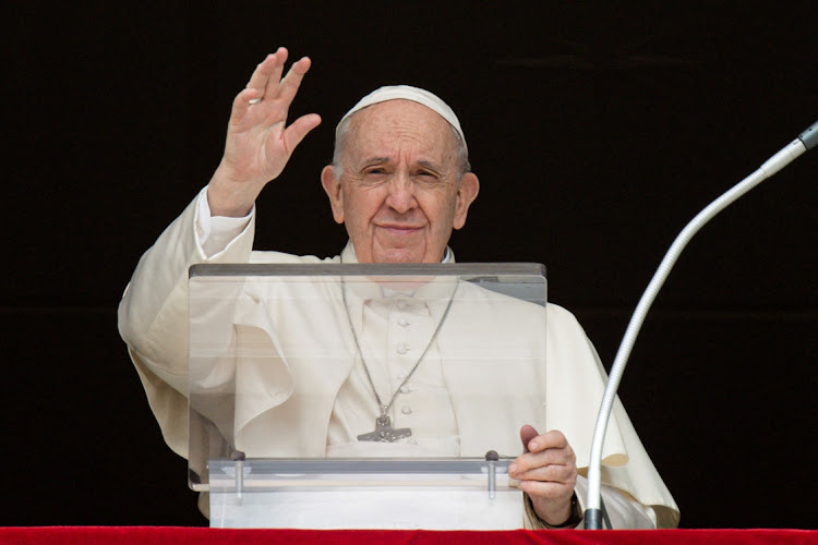 Pope Francis leads the Angelus prayer from the window of the Apostolic Palace at the Vatican, March 27 2022.