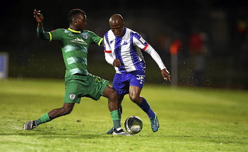 Tshidiso Patjie of Baroka tackles Mxolisi Kunene of Maritzburg United in an earlier league clash. The struggling sides face off again tomorrow.