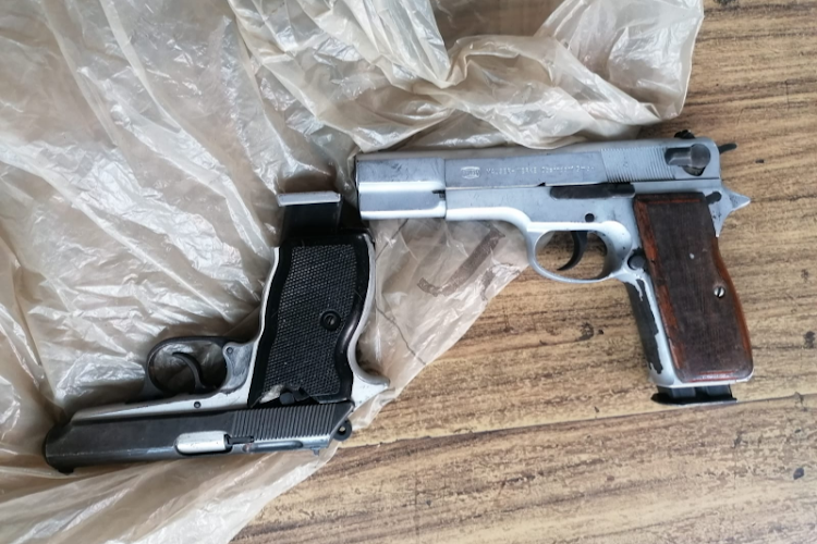 Police recovered these pistols after arresting hijacking suspects at Jeppe Hostel on Wednesday.