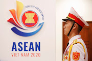 A military soldier stands guard at the ASEAN summit in Hanoi, Vietnam November 12, 2020. 