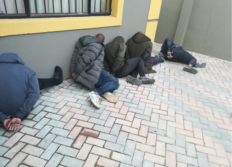 Six suspects have been arrested in connection with the killing of a security guard during an attempted robbery at Dragon City in Johannesburg on Friday afternoon.