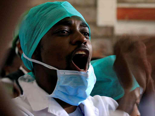 A Kenyan doctor shouts during a demonstration to press for better salaries in Nairobi, December 5, 2016. /REUTERS