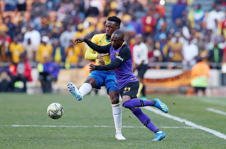 Kaizer Chiefs forward Khama Billiat fights for the ball with Motjeka Madisa of Mamelodi Sundowns during the Shell Helix Ultra Cup match at the FNB Stadium, Johannesburg on July 21 2018.