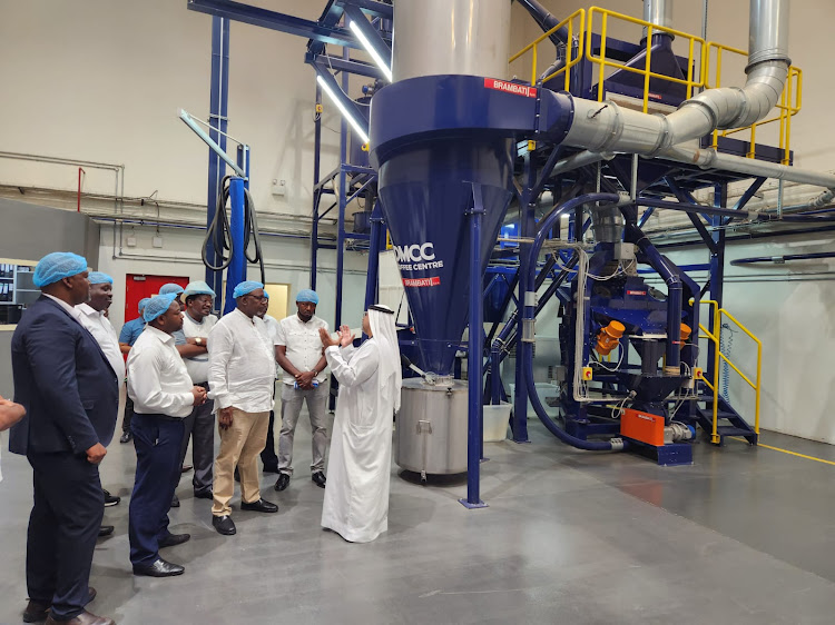 Agriculture CS Mithika Linturi flanked by KTDA officials and other Kenyan government representatives during a fact-finding mission at the Dubai Multi-Purpose Commodity Center (DMCC) in the United Arab Emirates.