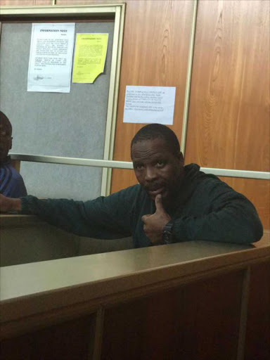 UNCOMFORTABLE: Robbery accused Phumezo Ngqina in the dock