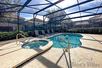 Sun-drenched extended pool and spa deck at this Solterra vacation villa