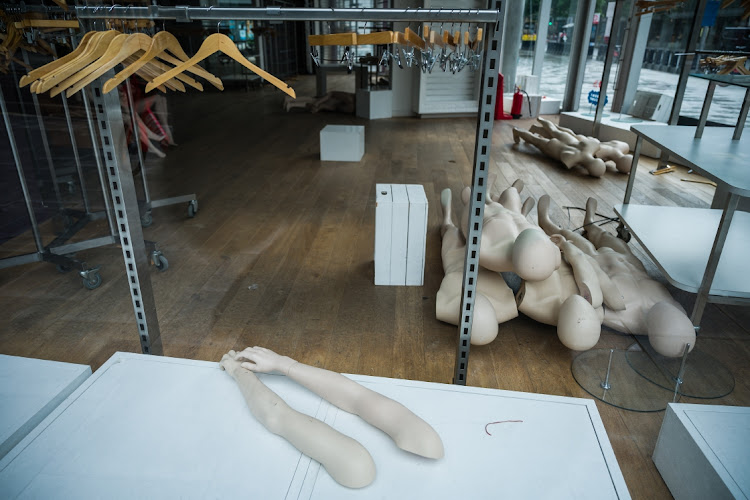 Mannequins and empty clothes rails are seen in a permanently closed store on July 27 2020 in London, England. Picture: GETTY IMAGES/LEON NEAL