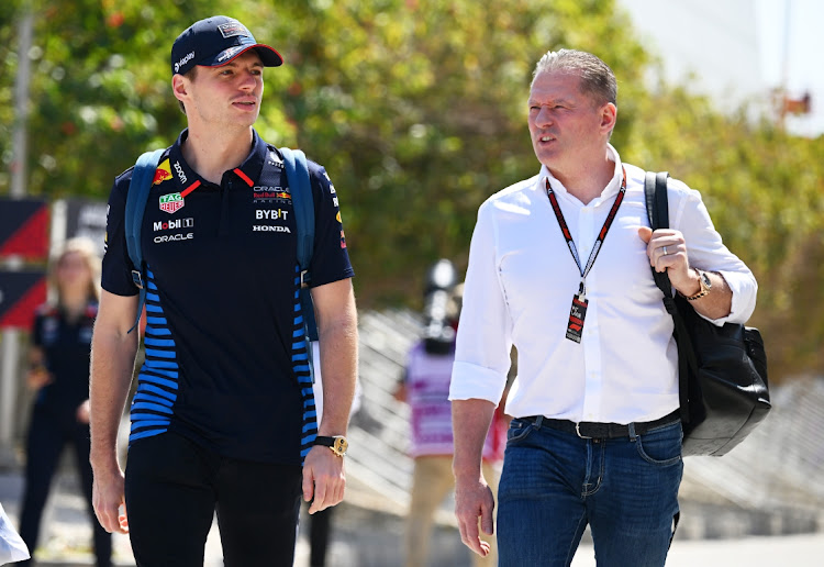 Max Verstappen and his father, Jos, in the paddock before practice ahead of the F1 Grand Prix of Bahrain on February 29. Picture: CLIVE MASON/GETTY IMAGES