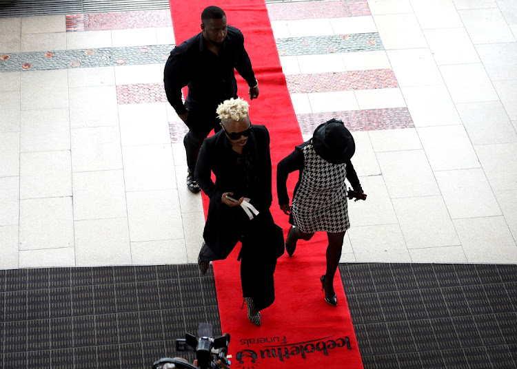 Guests arrive at the funeral of Mbongeni Ngema at the Durban International Convention Centre on Friday.