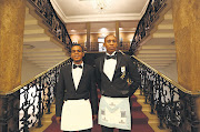 Meshak Amisi and Reneoue Kortjaas in the Freemason's Hall in Parktown, Johannesburg, wearing some of the regalia of the brotherhood. 