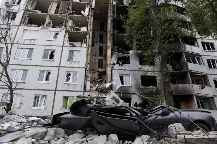 A damaged building is pictured, amid Russia's attack on Ukraine, in Kharkiv, Ukraine, April 29 2022. REUTERS/RICARDO MORAES.