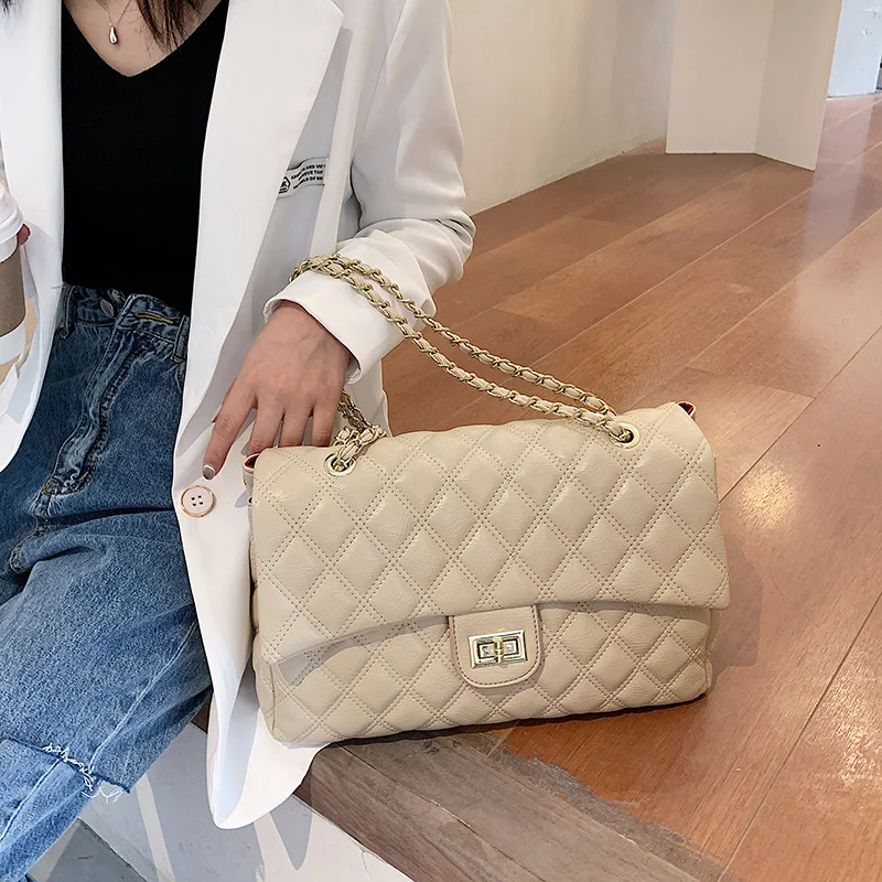Dames Kleine Xiangfeng Lingge schoudertas met ketting. Compact en stijlvol, ideaal om je essentials met gemak en elegantie te dragen. Perfect voor dagelijks gebruik.