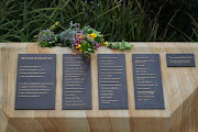 Flowers are seen on a memorial plaque at Dolphins Point, Coogee Beach on October 12, 2022 in Sydney, Australia. The 2002 Bali bombings claimed 202 lives, including 88 Australians, with many more wounded. Three bombs were detonated in busy Bali night spots the Sari Club and Paddy's Bar in Kuta at 11pm on 12 October 2002 by the terrorist organisation Jemaah Islamiyah. The attacks represent the single largest loss of Australian life due to an act of terror.  