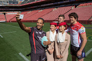 The Emirates Lions rugby players pose for pictures wearing the new home and away kit for the new season. 