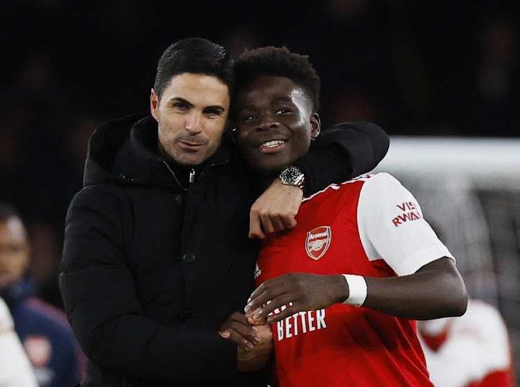 Arsenal manager Mikel Arteta and Bukayo Saka celebrate after the match against West Ham United at Emirates Stadium in London, Britain, December 26 2022. Picture: ANDREW COULDRIDGE/ACTION IMAGES/REUTERS