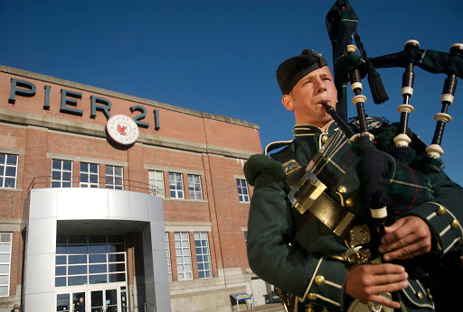 A bagpiper at Pier 21 in Halifax, Nova Scotia. 