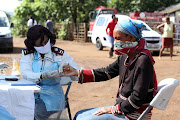 A nurse tests a resident during a sanitation programme of informal settlements in Mkhuze, Northern Zululand. 