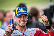 Thumbs up for Fabio Di Giannantonio of Italy and Gresini Racing MotoGP after he won the pole position during the qualifying practice of the MotoGP Gran Premio d’Italia Oakley at Mugello Circuit on May 28, 2022 in Scarperia, Italy.