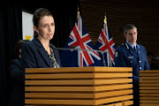 Prime Minister Jacinda Ardern and Police Commissioner Andrew Coster during a press conference in Parliament on September 4, 2021 in Wellington, New Zealand. Police shot and killed a 