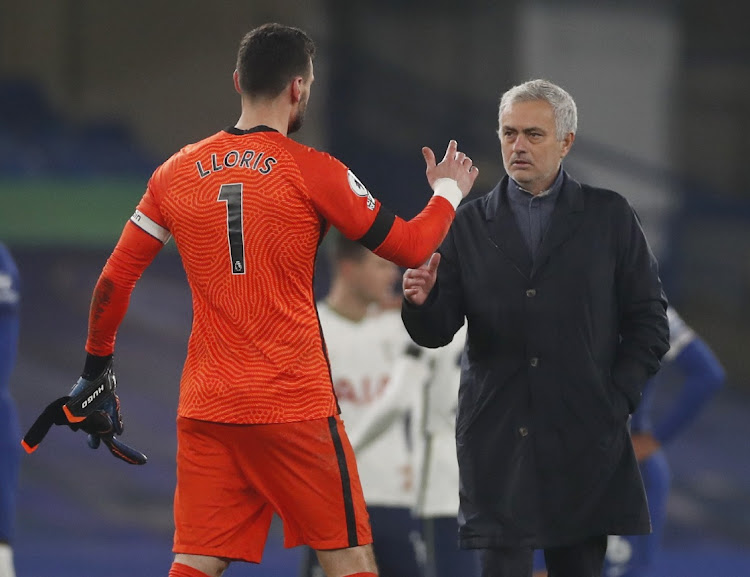 Tottenham Hotspur manager Jose Mourinho shakes hands with his goalkeeper Hugo Lloris after the Premier League match against Chelsea at Stamford Bridge, London on November 29, 2020