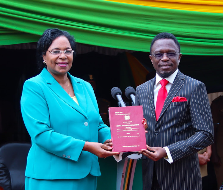 Youth Affairs and Sports CS Ababu Namwamba with outgoing Youth CS Margaret Kobia at NYS headquarters on Monday, November 7, 2022.