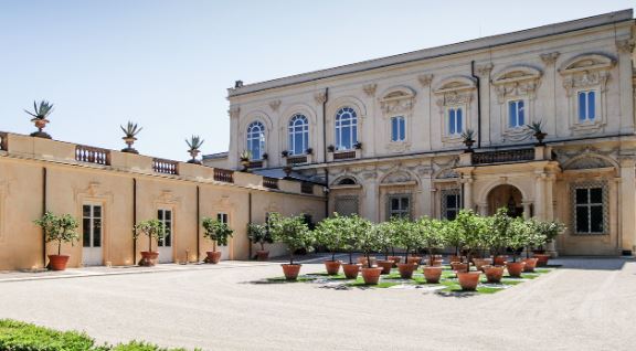 Facade of gorgeous classic structured Villa Aurelia in Rome Italy