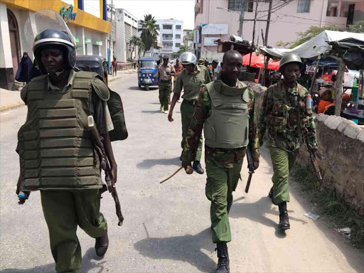 Police patrol the streets of Mombasa to disperse NASA supporters demonstrating against IEBC, October 13, 2017. /ELKANA JACOB