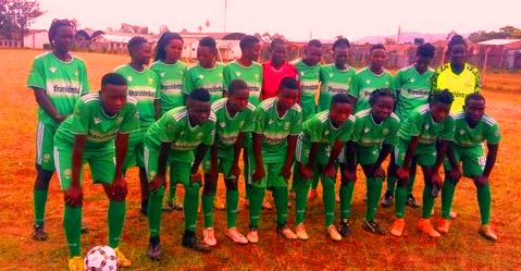 Bunyore Starlets posed for a photo after receiving the new uniform from Harold Mbati Foundation.